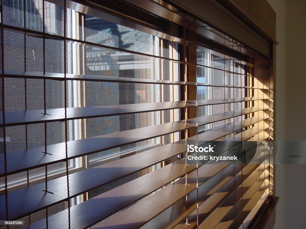 Close-up of open wooden window blinds Wooden window blinds. Built Structure Stock Photo