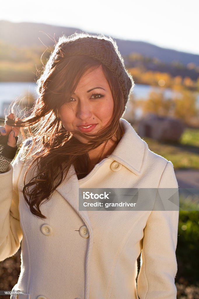 Portrait of a Pretty Girl in the Fall Beautiful young woman close up with de-focused background autumn scene Adult Stock Photo