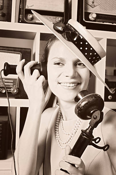 istock Woman talking on vintage telephone 183237777