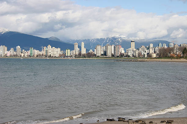 Vancouver English Bay Skyline Looking toward English Bay from Kitsilino Beach beach english bay vancouver skyline stock pictures, royalty-free photos & images
