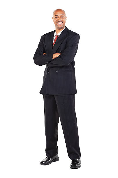 istock businessman in suit with crossed arms 183238288