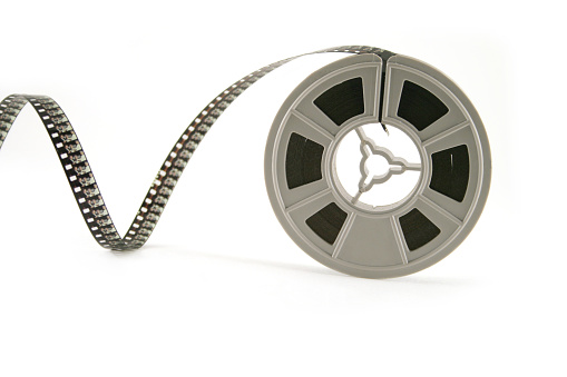 Film reel on a white background.