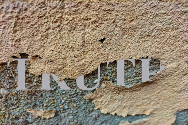 Concept photo with a peeling layer of paint and the release from under it of the inscription truth, lies will always be exposed, truth revealed Concept photo with a peeling layer of paint and the release from under it of the inscription truth, lies will always be exposed, truth revealed. respect stock pictures, royalty-free photos & images