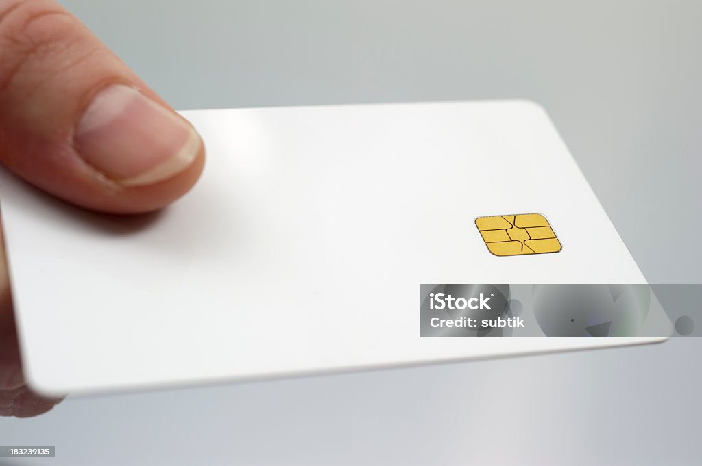electronic cash hand, holding a white, blank credit card Blank Stock Photo