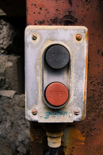old rusty start stop buttons