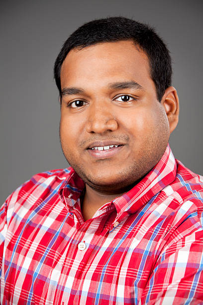 istock Studio portrait of handsome indian man in his 20s 183240259