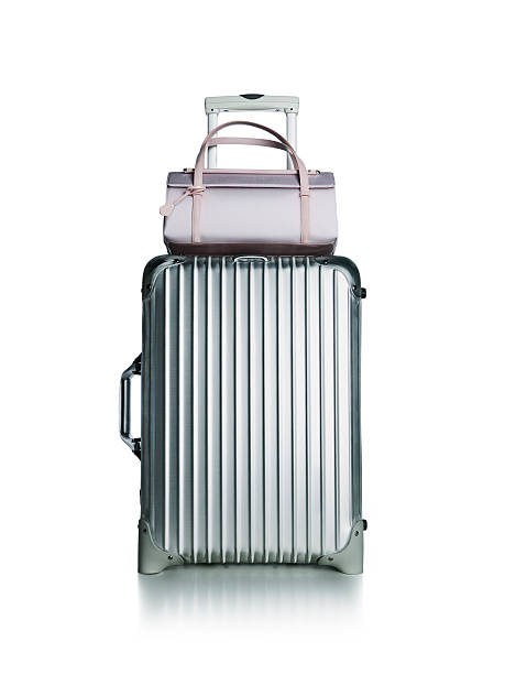 istock Suitcase luggage and purse 183240520
