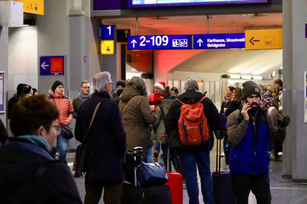 Passengers in Koblenz Train Station Koblenz, Germany - December 03, 2023: Passengers in Koblenz Train Station. zurich train station stock pictures, royalty-free photos & images