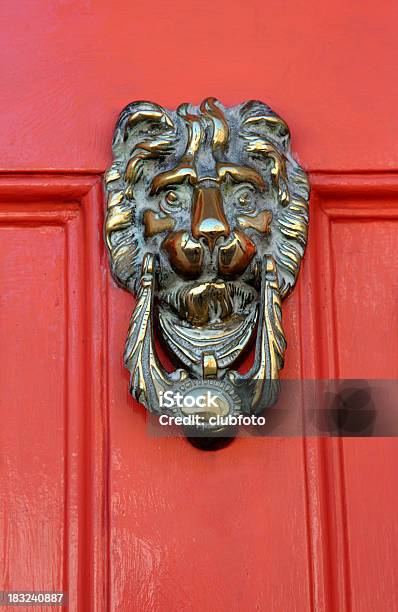 Brass Lions Head Knocker On A Red Door Stock Photo - Download Image Now - Architecture, Brass, British Culture