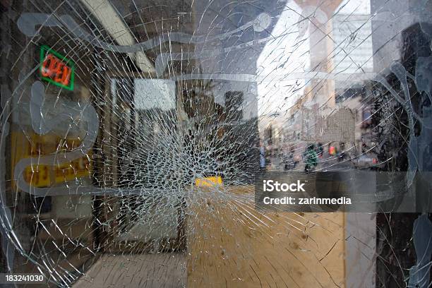 A Shattered Store Window From The Outside Looking In Stock Photo - Download Image Now