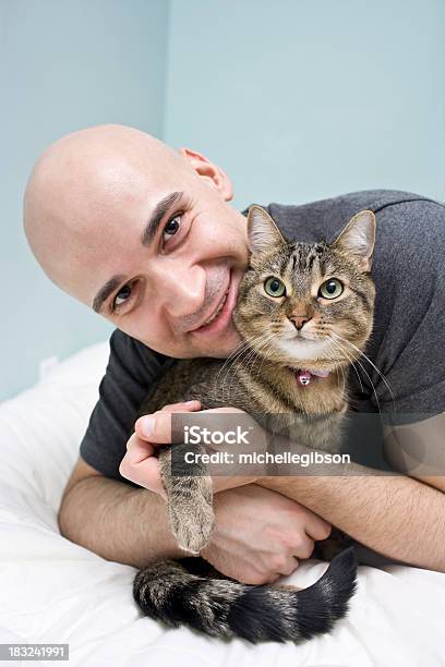 Man And Cat Stock Photo - Download Image Now - 30-39 Years, Adult, Adults Only