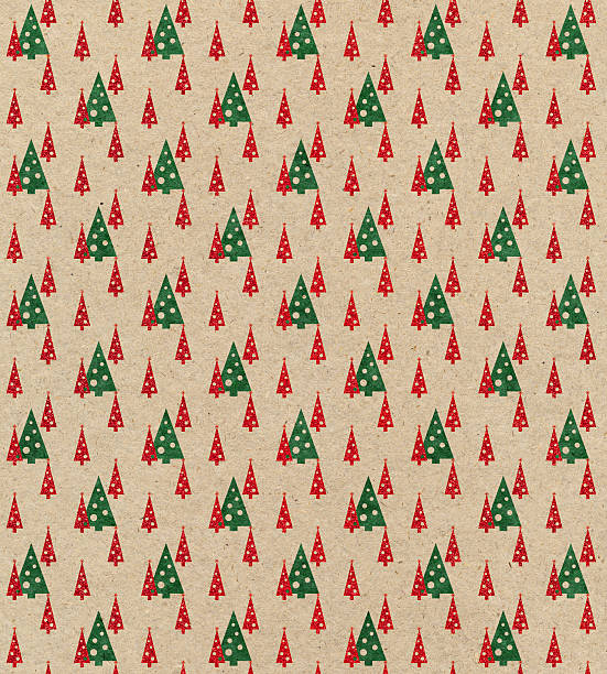 braunes papier mit weihnachtsbaum-motiv - christmas paper stock-fotos und bilder