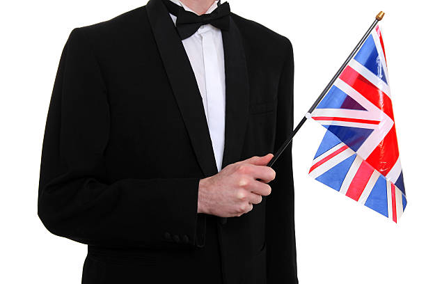 istock Male in tuxedo with Union Jack flag 183242607