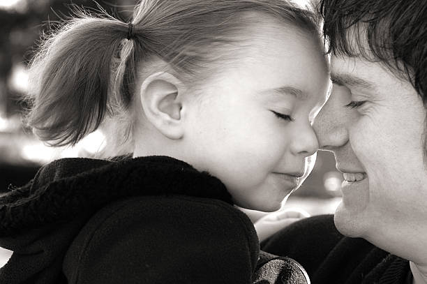 istock Black & White Image of Precious Moment Between Daddy and Daughter 183242745