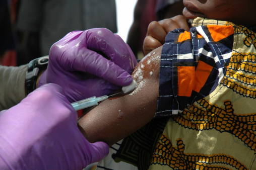 An American spends his vacation in Africa vaccinating children against disease.