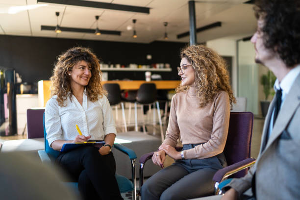 istock Group of business people having a group therapy with their coach in the office 1832437032