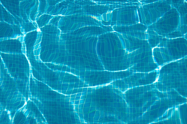 プールのリップル背景 - sunbeam underwater blue light ストックフォトと画像