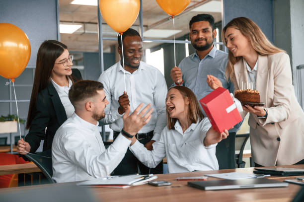 istock Employee having a birthday in the office, group of workers 1832445672