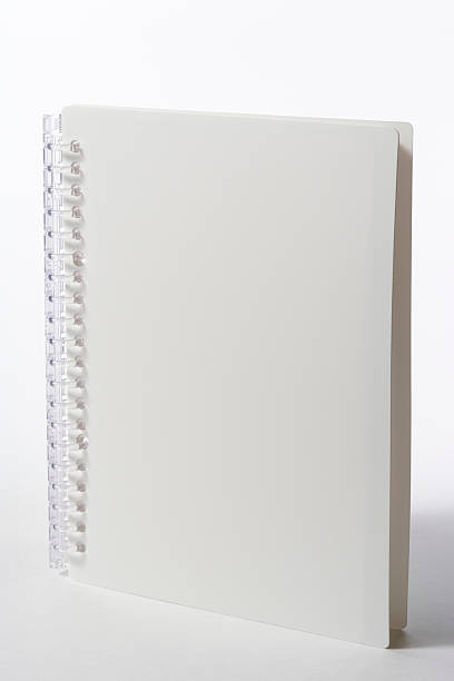 istock Isolated shot of standing blank spiral notebook on white background 183245022