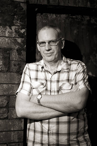 istock Mature man in check shirt portrait 183245177