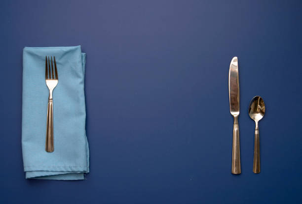 istock Place Setting on Blue Background with Space for Your Plate 183245472