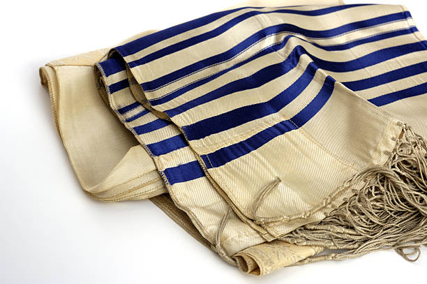 Jewish tallis Prayer shawl worn by Jewish males in worship. It shows the knots that have meaning. jewish prayer shawl stock pictures, royalty-free photos & images
