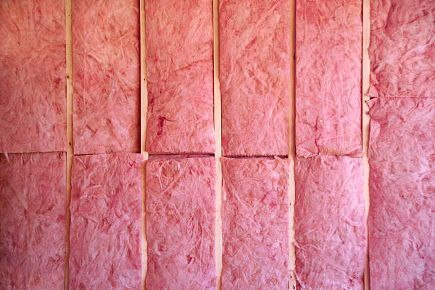 wall of pink insulation stock photo