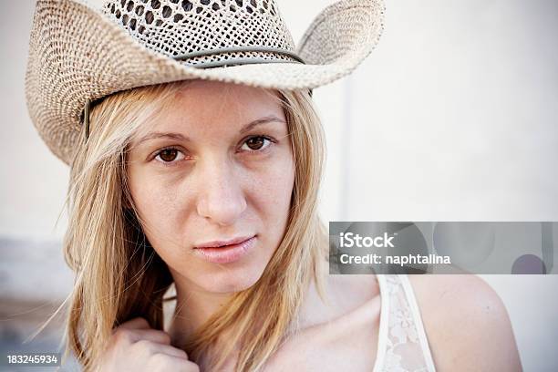 Cowboy with blonde hair and hat - wide 8