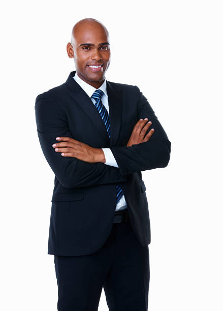 istock Smiling African-American businessman with arms folded 183246220