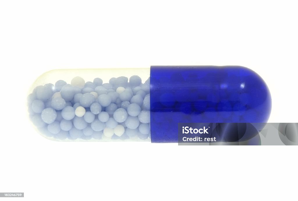 Gros plan d'une isolation blue capsule - Photo de Antibiotique libre de droits