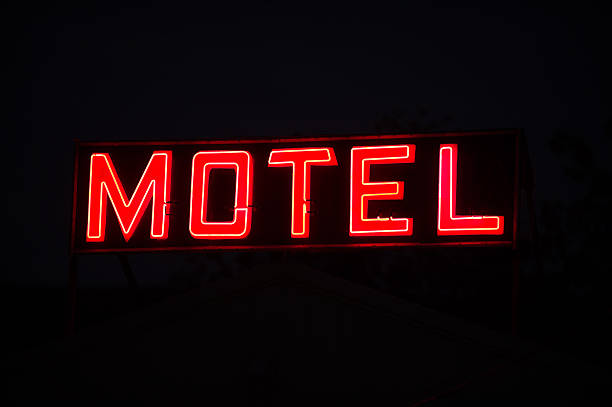 istock Motel Sign in Red Neon At Night, Black Background 183246905