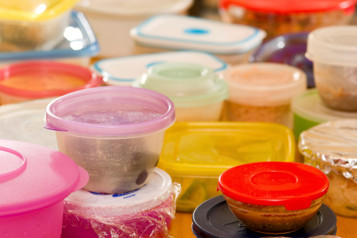 Several plastic food containers with leftovers.Click to see more food shots: