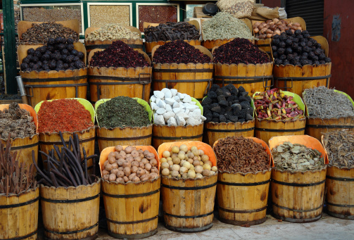 Buckets full of various spices for sale on Egyptian market. Photo: April 2006