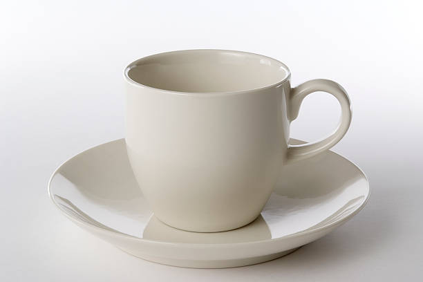 istock Isolated shot of white coffee cup on white background 183247435
