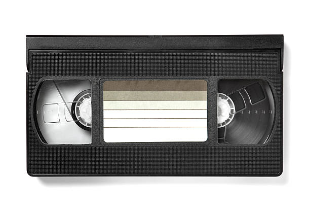 A watched VHS tape with a blank label Photo of an old VHS video tape and label cassette tape stock pictures, royalty-free photos & images