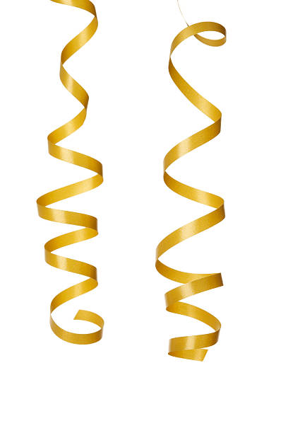 Two golden streamers isolated Two golden streamers isolated on white background. This is an exclusive image and it can only be found in iStockphoto. streamer stock pictures, royalty-free photos & images