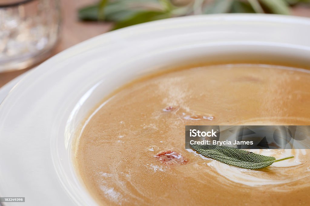 Butternut Squash Soup Bowl of Butternut Squash soup garnished with sage.Similar Images: Autumn Stock Photo