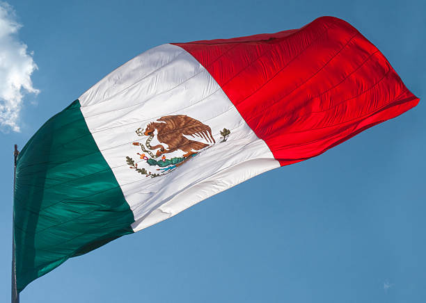 istock Flag of Mexico with blue sky 183250318