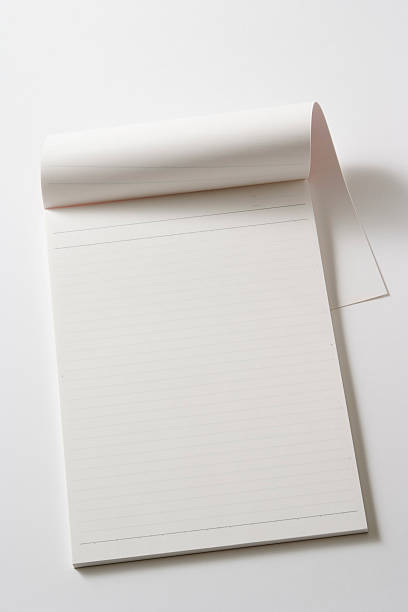 istock Isolated shot of blank notebook on white background 183250404