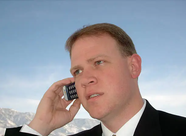 Photo of Businessman on Cell Phone