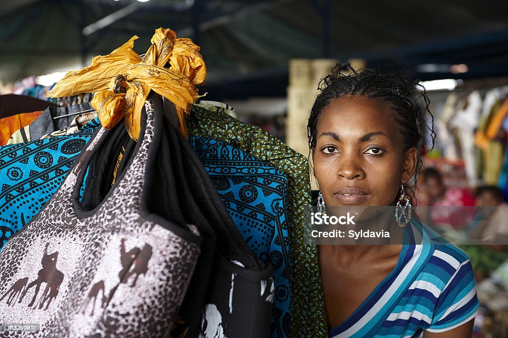 African Market "Young woman, looking at the camera, working in a street market in Nairobi (Kenya)" Kenya Stock Photo