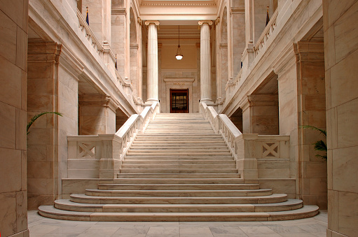 3d illustration. Modern staircase with glass railings in the interior