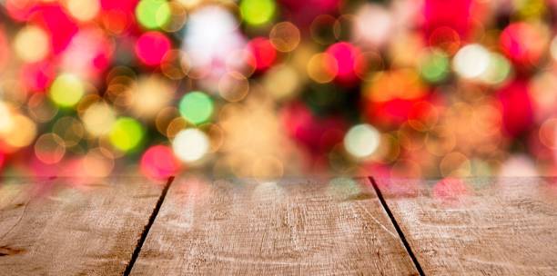 istock Wooden table with blurred lights in the background 1832509367