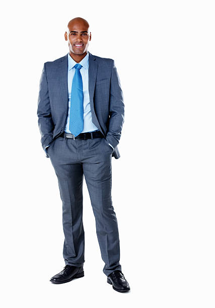 istock Middle aged business man with hands in pockets against white 183251270