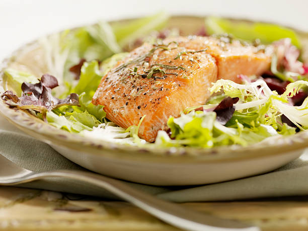 Salmon Filet on a Bed Of Fresh Salad -Photographed on Hasselblad H3-22mb Camera