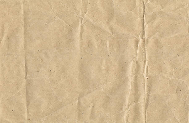 crinkled papel marrón - plano documento fotografías e imágenes de stock