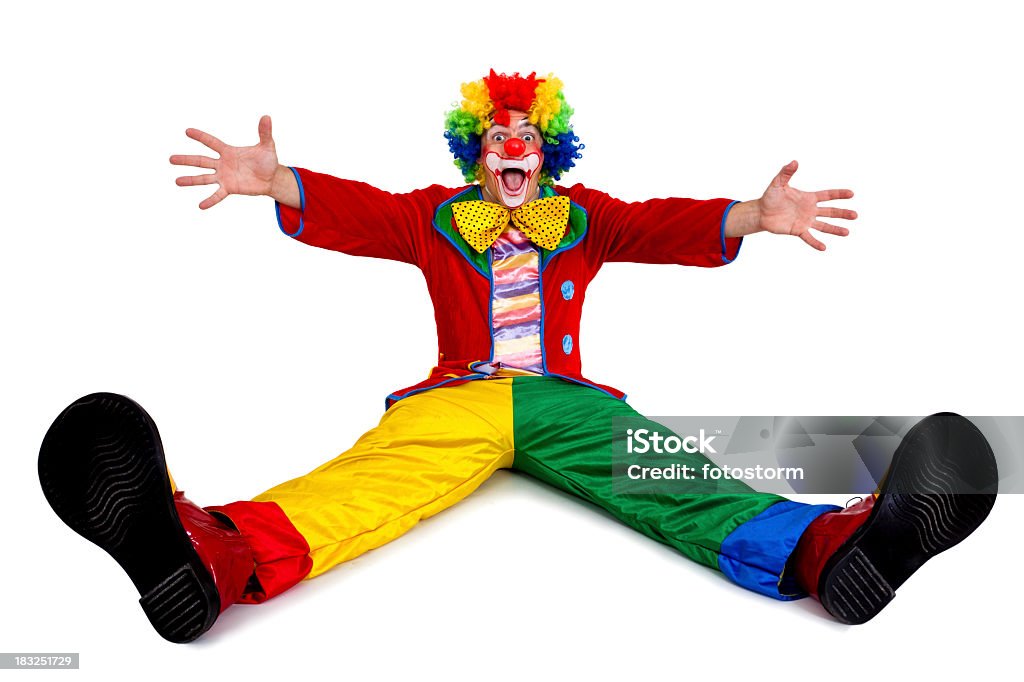 Lustiger clown Sitzbereich mit ausgestreckten Armen und Beinen - Lizenzfrei Clown Stock-Foto