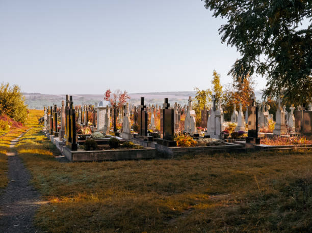 istock Modern cemetery with graves and crosses. 1832520929