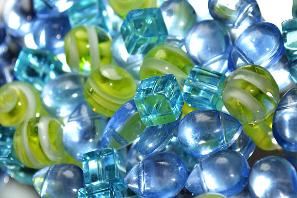 istock Abstract Glass Beads Shades of Blue Green Full Frame Background 183252553
