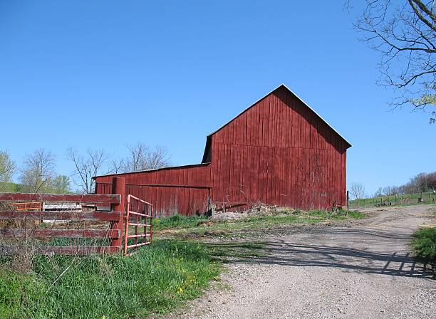 istock Red Barn and Fence 183253060